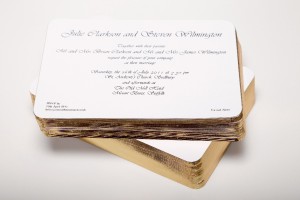 Gold gilt edged invitations printed in black thermo