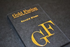 Gold foiled business cards printed on black board